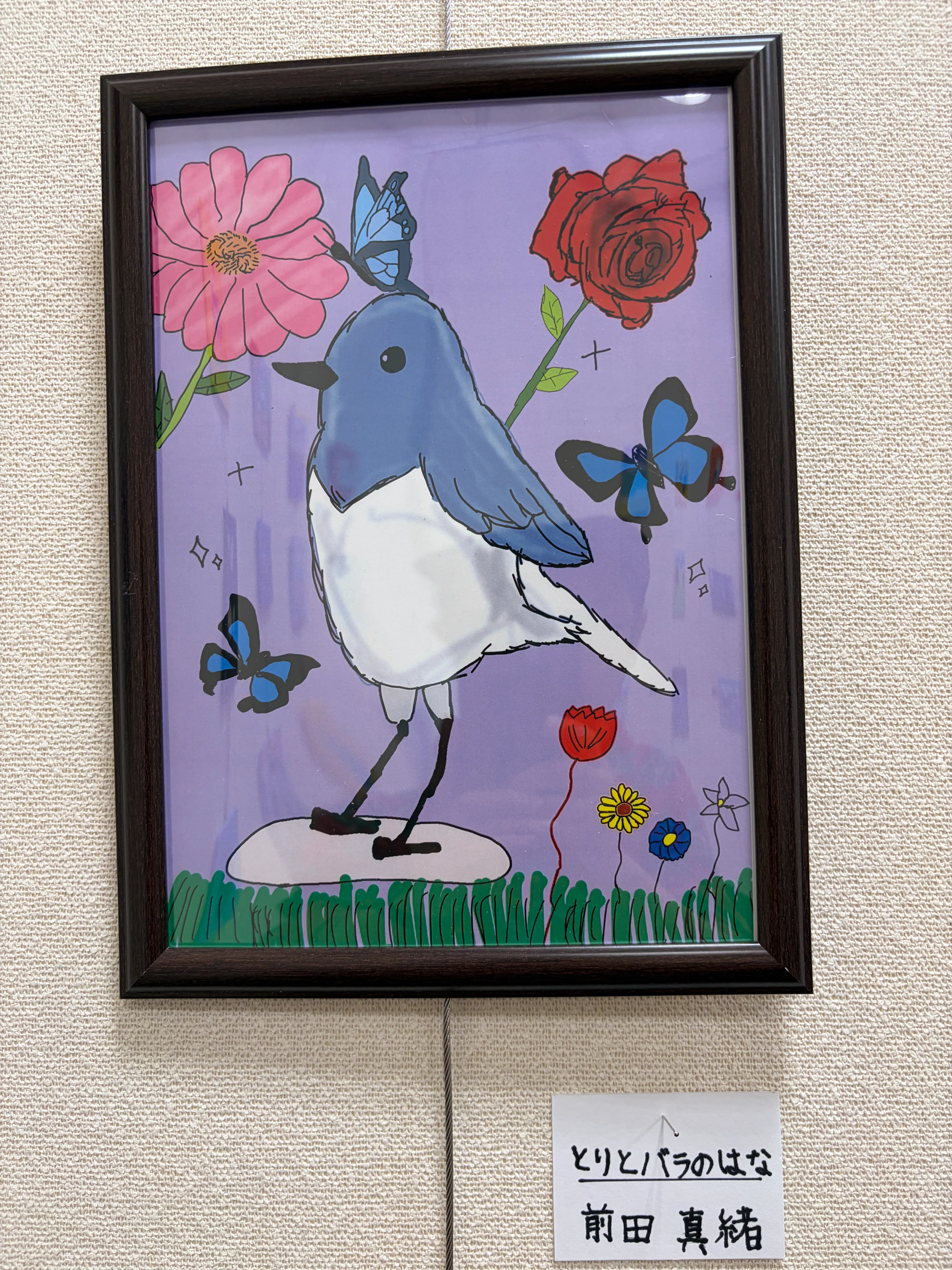 鳥とバラの花